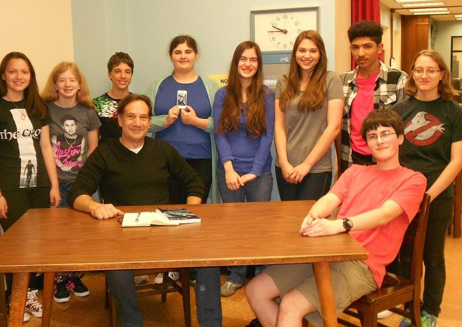 Author Greg DAlessandro with Creative Writing Club members Alli Getchell, Kelly Nelson, Justin Rodrigues, Victoria Jungermann, Raiya Isaac, Amanda Kearny, Christian Castillo, Danielle Maggiorie and Evan Voss