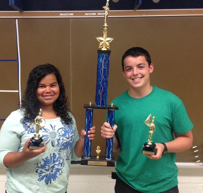 Co-drum majors, Adamarie Santiago and Michael Carone, with 1st Place Kick-Off Classic trophy
